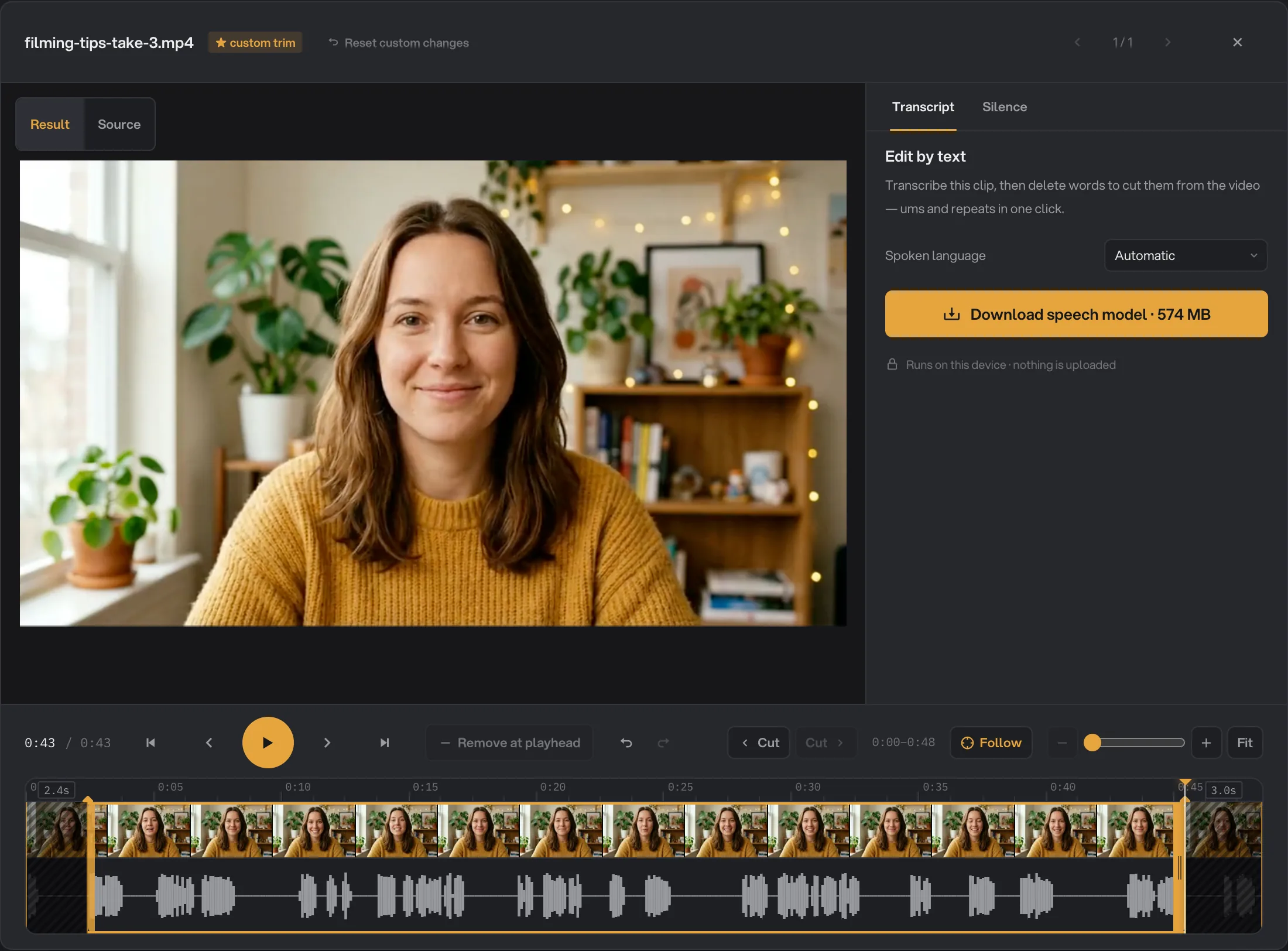 Trim video editor with the clip filming-tips-take-3.mp4, trim handles set on the timeline and the Transcript tab offering edit by text