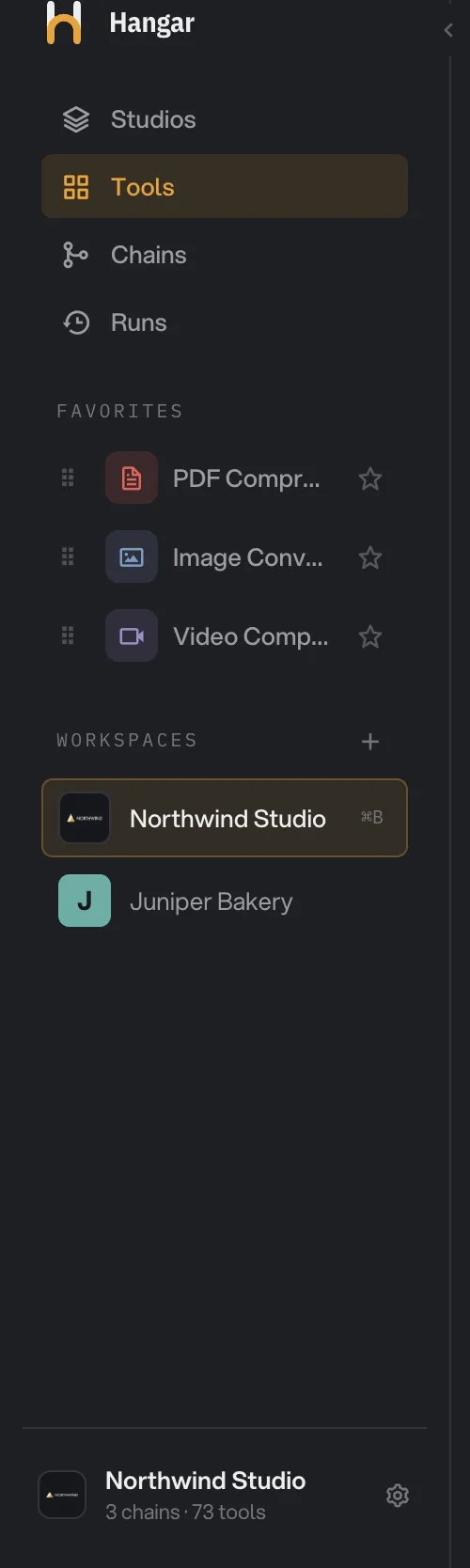 The Hangar sidebar with two workspaces, Northwind Studio selected and Juniper Bakery below it, a plus button to create a workspace, and the footer naming Northwind Studio with 3 chains and 73 tools